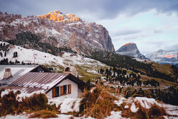 Mountain huts beneath the hill at Dolomites, Italy.