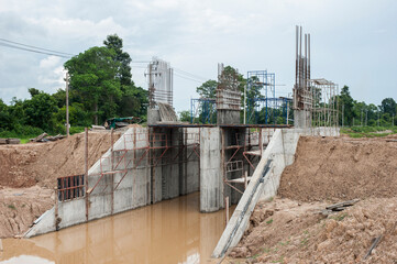 The construction site of two floodgates is responsible for the work by the Royal Irrigation Department.
