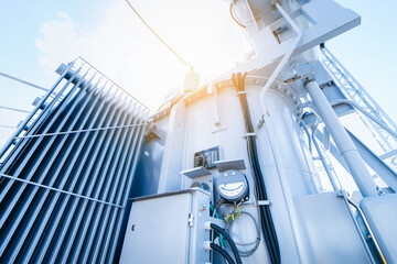 Modern new power station. The equipment used to raise or lower voltage, high voltage power station. Electrical Transformer
