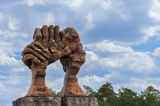 Helmstedt -Marienborn Germany, August 4, 2022: Memorial German division sculpture of two hands in Helmstedt -Marienborn former border crossing of the inner-German border between East and West Germany.