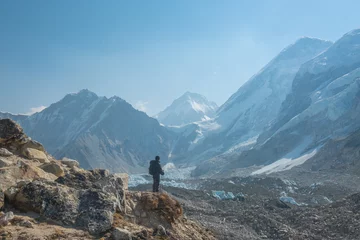 Fototapete Ama Dablam Male backpacker enjoying the view on mountain walk in Himalayas. Everest Base Camp trail route, Nepal trekking, Himalaya tourism.
