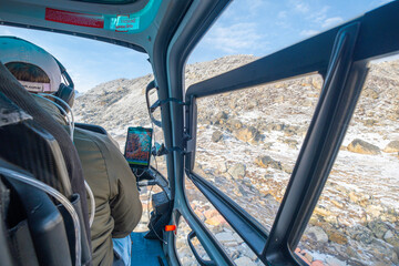 Gorakshep rescue helicopter in action Himalayas Nepal, small settlement that sits at its edge at 5,164 m elevation, near Mount Everest