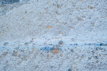 Everest base camp Gorakshep rescue helicopter in action Himalayas Nepal, small settlement that sits at its edge at 5,164 m elevation, near Mount Everest