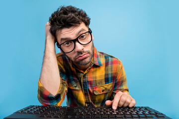 Photo of upset tired freelancer in specs dressed checked shirt look at webcam on remote video call...