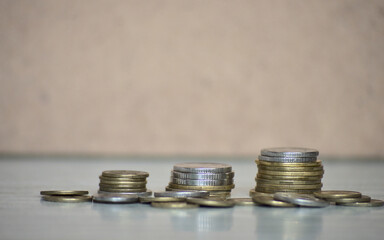 stacks of coins (yellow and white)
