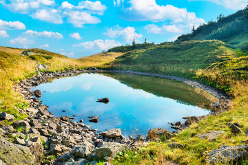 Fototapeta na wymiar Lake in mountains, landscape mountain lake with blue water