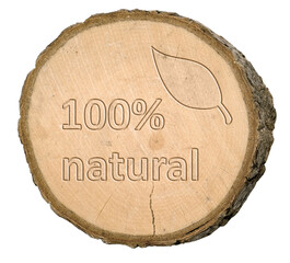 Tree disc or tree slice with bark on which the word is 100% natural and a leaf can be seen on a white background, isolated