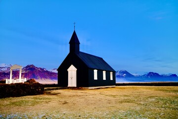 Fototapeta na wymiar Die Kirche von Búðir Island Sonnenuntergang 