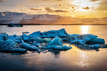 Incredible landscape with icebergs in Jokulsarlon glacial lagoon at sunset. Vatnajokull National...
