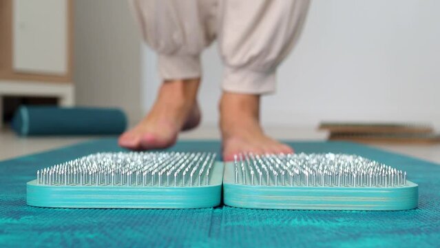 Open boards for sadhus to practice through mental and physical pain. Sharp nails for meditation, sadhu yoga practice. First step on nails