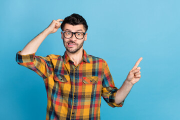 Fototapeta premium Photo of think guy index promo wear eyewear yellow shirt isolated on blue color background