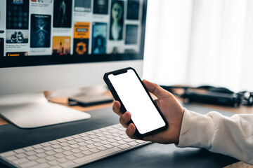 Man working on computer desk at home office
