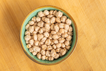 Dried Legumes In Bowls On Wooden Cutting Board.