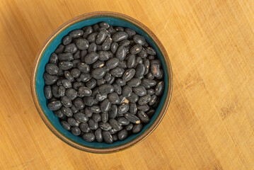Dried Legumes In Bowls On Wooden Cutting Board.
