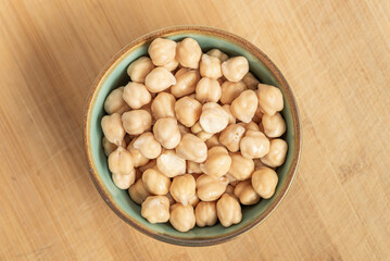 Dried Legumes In Bowls On Wooden Cutting Board.