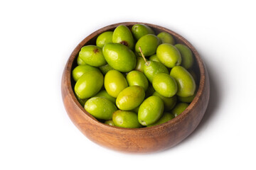 Fresh green olives on the white background