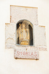 detail of the statue of St. Nicholas as patron and protector of the city religious concept