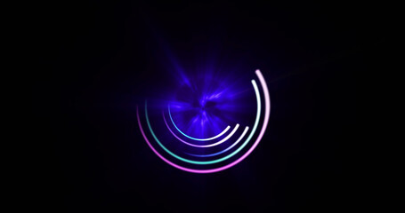 Image of glowing pink, blue and green circles over black background