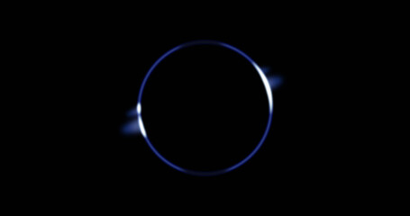 Image of glowing blue circle over black background