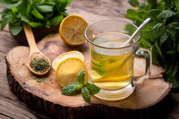 Tea with lemon and mint (Turkish name; nane limon cayi) - obrazy, fototapety, plakaty