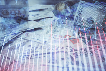 Multi exposure of forex chart drawing over us dollars bill background. Concept of financial success markets.