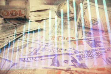 Multi exposure of forex chart drawing over us dollars bill background. Concept of financial success markets.