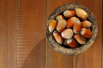 freshly harvested in shell whole Hazelnuts in a bowl