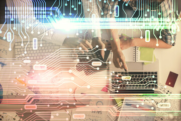 Double exposure of man and woman working together and data theme hologram drawing. Computer background. Top View.