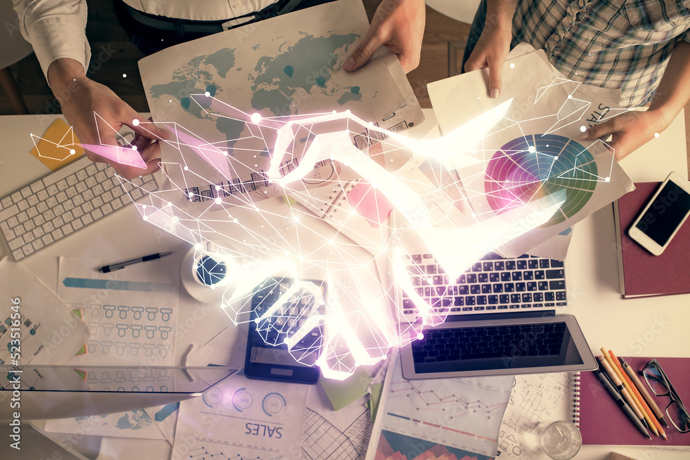 Poster double exposure of man and woman working together and the handshake hologram drawing. computer backg