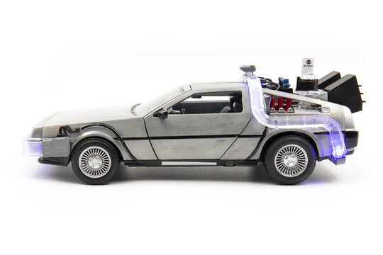 Back to The Future Delorean Time Machine - 1-24 Scale Diecast Model Toy Car - side view - on white background