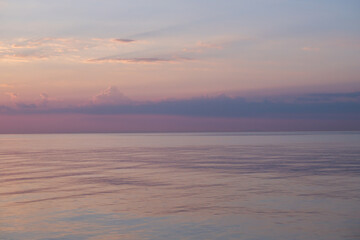 Blurred background sea and sky at sunrise.