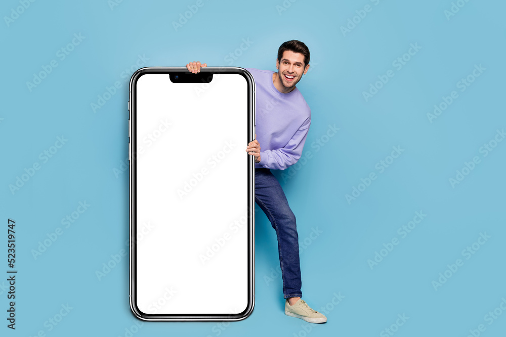 Canvas Prints Full body photo of cheerful funny guy demonstrate empty space blank offer isolated on blue color background