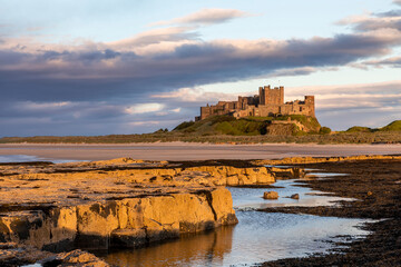 Bamburgh Castle from Harkness Rocks sunset