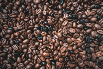 roasted beans coffee, brown background
