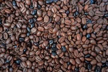 roasted beans coffee, brown background