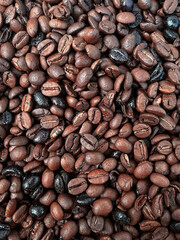 roasted beans coffee, brown background