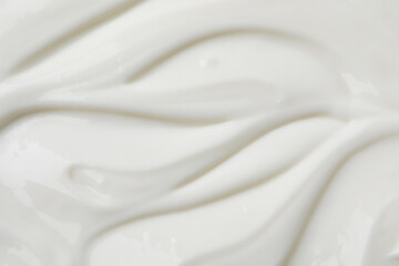 Fototapeta na wymiar Delicious organic yogurt as background, top view