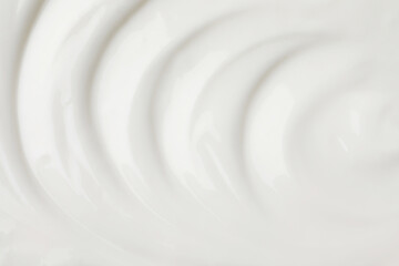 Obraz premium Delicious organic yogurt as background, top view