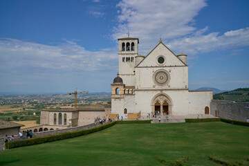 Basilica of Saint Francis of Assisi (basilica di San Francesco in Assisi) Italian gothic styled church in the ancient town of Assisi, Umbria, Italy - obrazy, fototapety, plakaty
