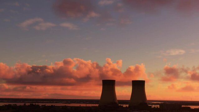 Aerial circular flight at sunset of a nuclear power plant in Doel. Belgium