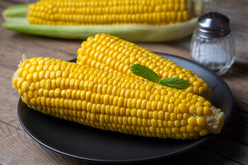 Boiled sweet corn, food concept photo