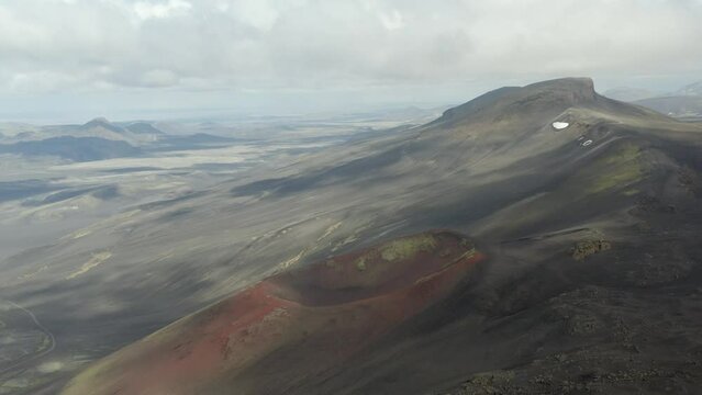 Red Volcanic Crater Of Raudaskal In Iceland. - aerial