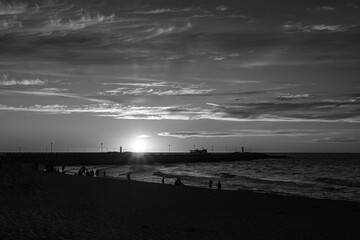 Sunset clouds over the sea - Black and White - obrazy, fototapety, plakaty