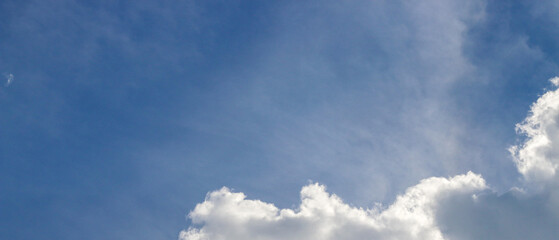 Cloudscape - Blue clear sky and white clouds, wide panorama The vast blue sky and clouds sky