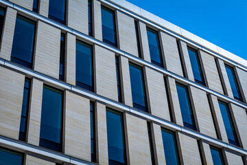 Detail of modern architecture with bricks and glass facade