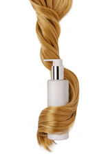 Shampoo bottle in hair lock isolated on white background. Natural cosmetic products for hair, mockup.
