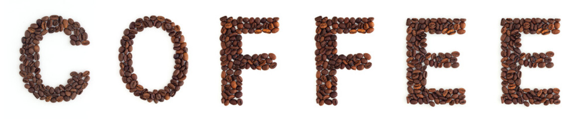 Word COFFEE from roasted coffee beans on white background.