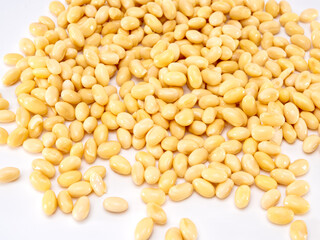 Soaked japanese soy beans isolated on white background.