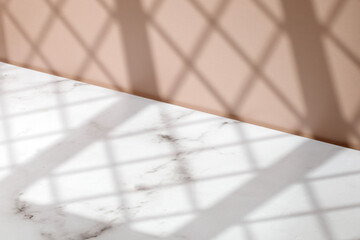 Scene with window shadow. Mock up. Minimal background for product presentation. Beige and marble background.
