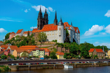 12.05.2022 view of the Albrechtsburg castle and the Meissen Cathedral with the Elbe river. Meissen,...
